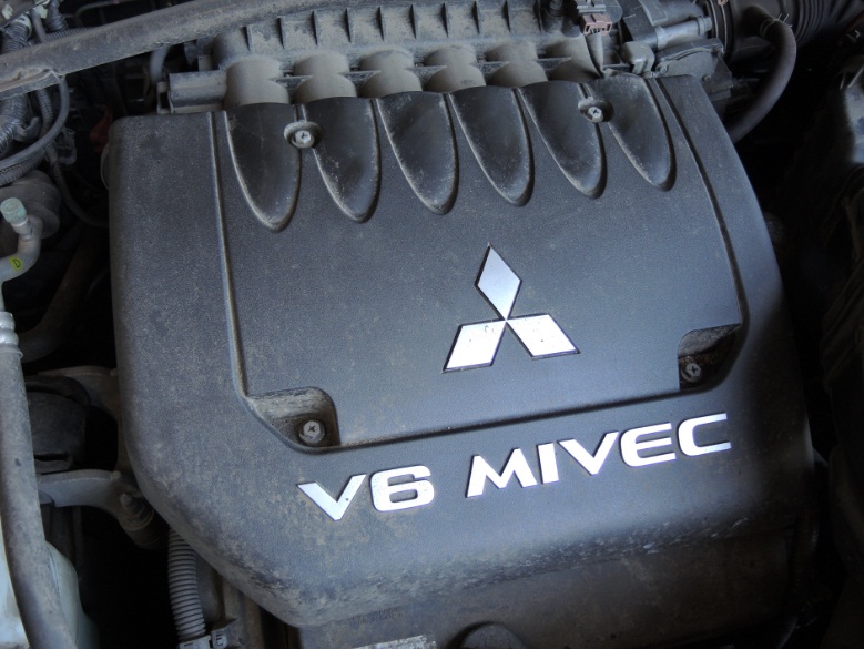 Когда и как часто нужно менять свечи зажигания и масла для mitsubishi outlander?