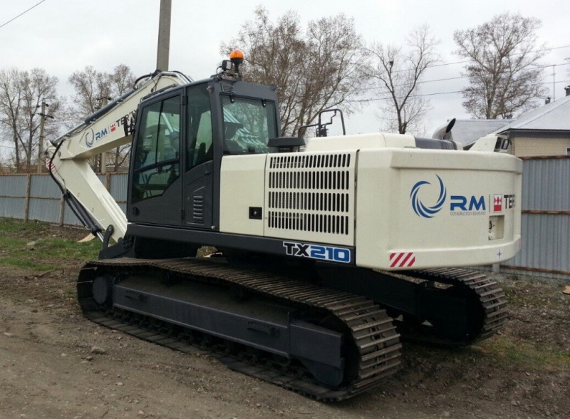Tx 210 (экскаватор) характеристики и цены, фотографии обзор