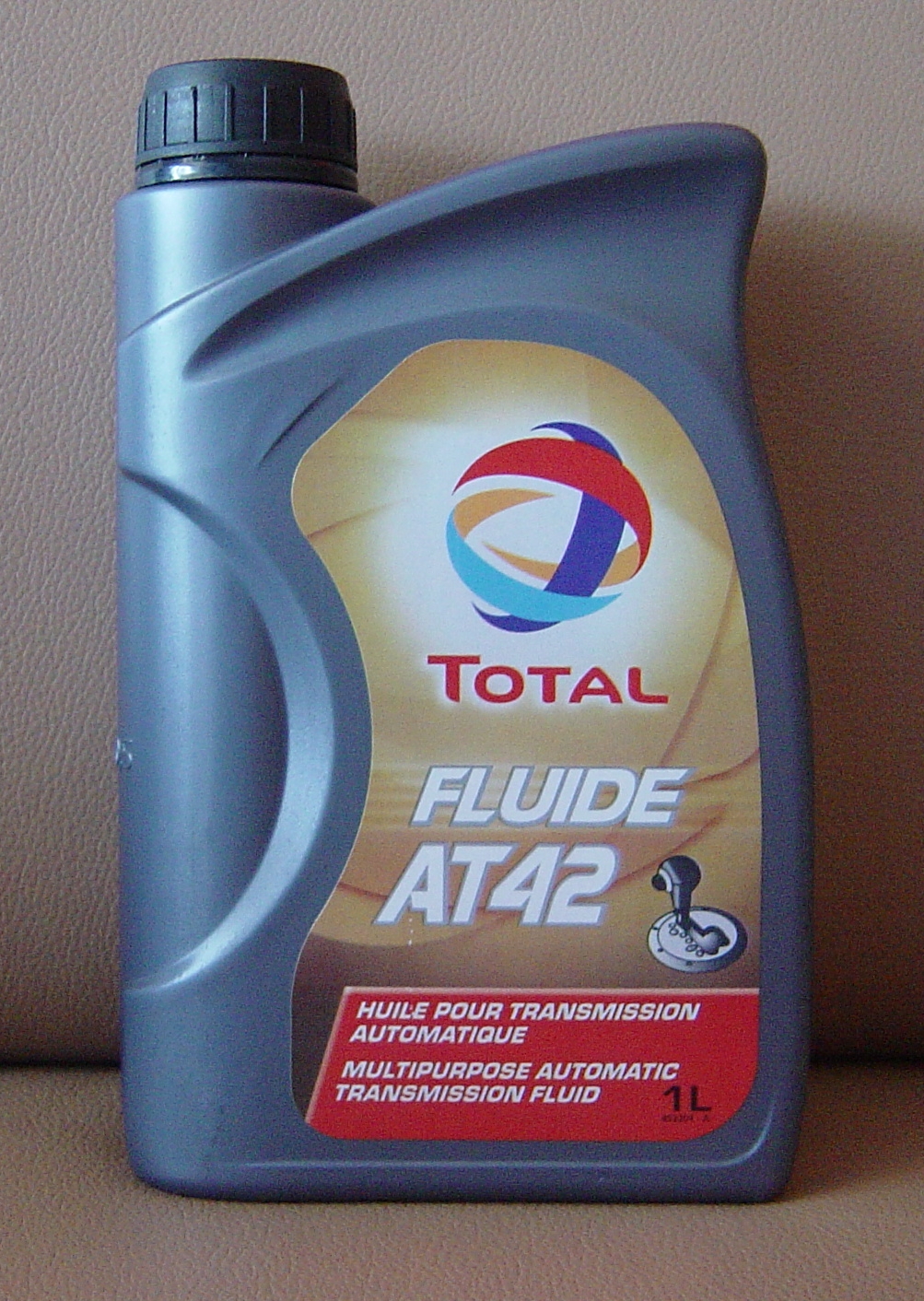 Сколько масла в МКПП коробке передач Пежо 206